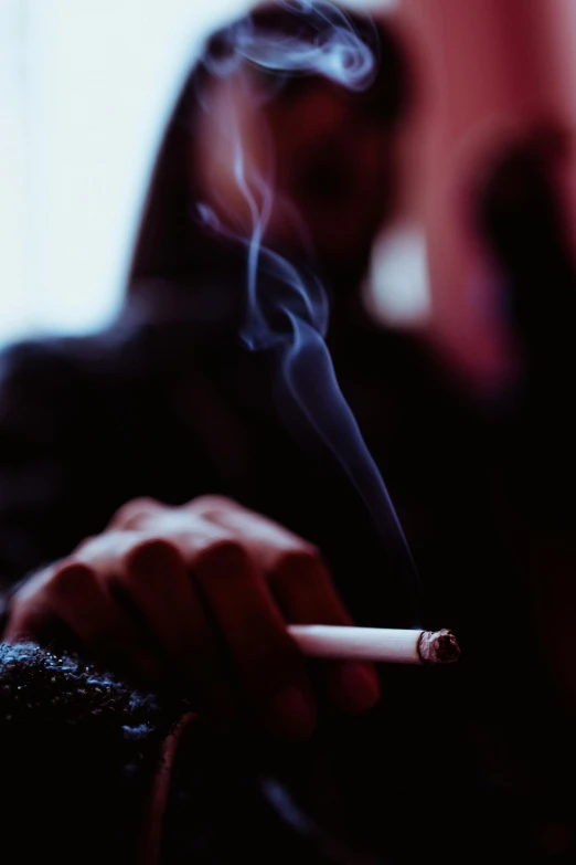 a close up of a person holding a cigarette, profile image, large)}], burning