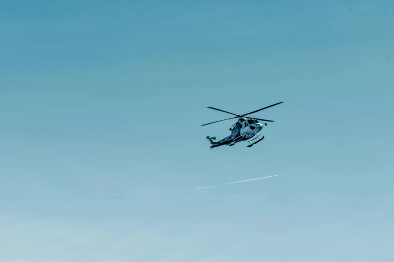 a helicopter that is flying in the sky, pexels contest winner, hurufiyya, blue, 15081959 21121991 01012000 4k, cinematic medium shot, instagram picture