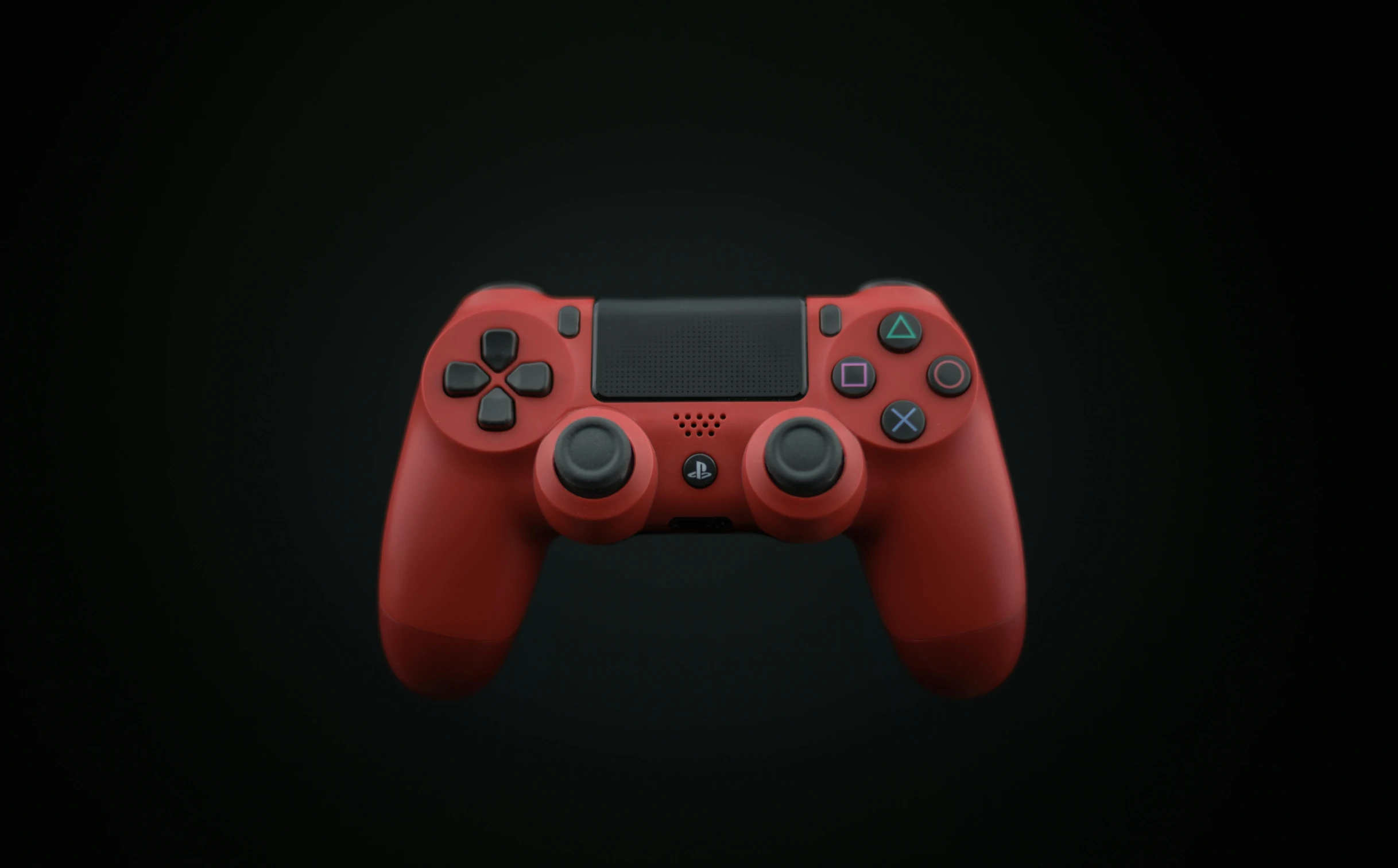 a red video game controller on a black background, a 3D render, inspired by Beeple, trending on polycount, shot with sony alpha 1 camera, silicone skin, detailed product image, ps 4