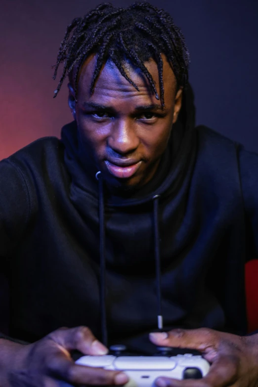 a man with dreadlocks playing a video game, an album cover, pexels contest winner, les nabis, cocky expression, ( ( dark skin ) ), xxxtentacion, press photos