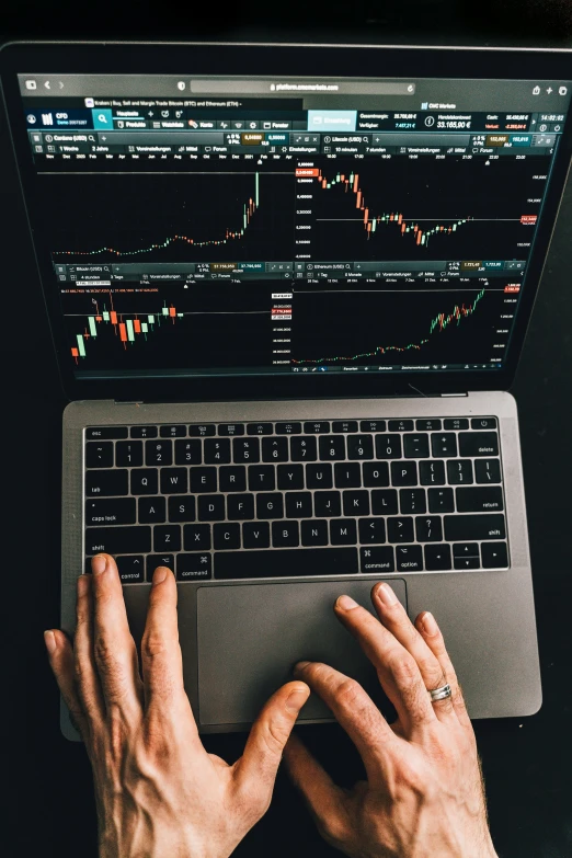 a close up of a person typing on a laptop, by Carey Morris, pexels, analytical art, displaying stock charts, ripple, inside a grand, promo image