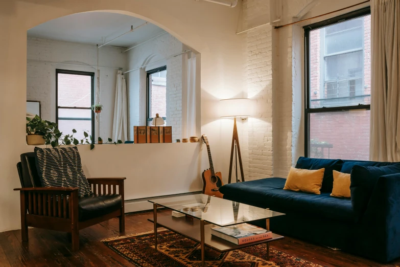 a living room filled with furniture and windows, pexels contest winner, light and space, a cozy old victorian loft, minimalist home office, couches vibrating and melting, ultrastation hq