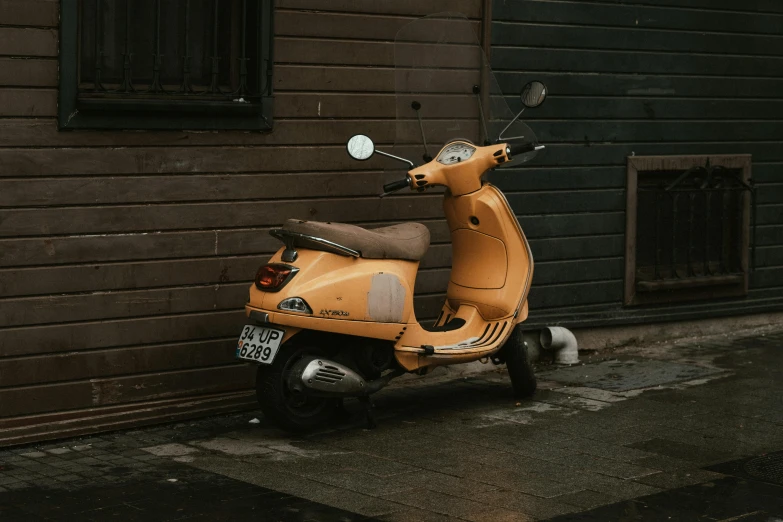 a motor scooter parked on the side of a building, a picture, mustard, low-light photograph, 🦩🪐🐞👩🏻🦳, brown