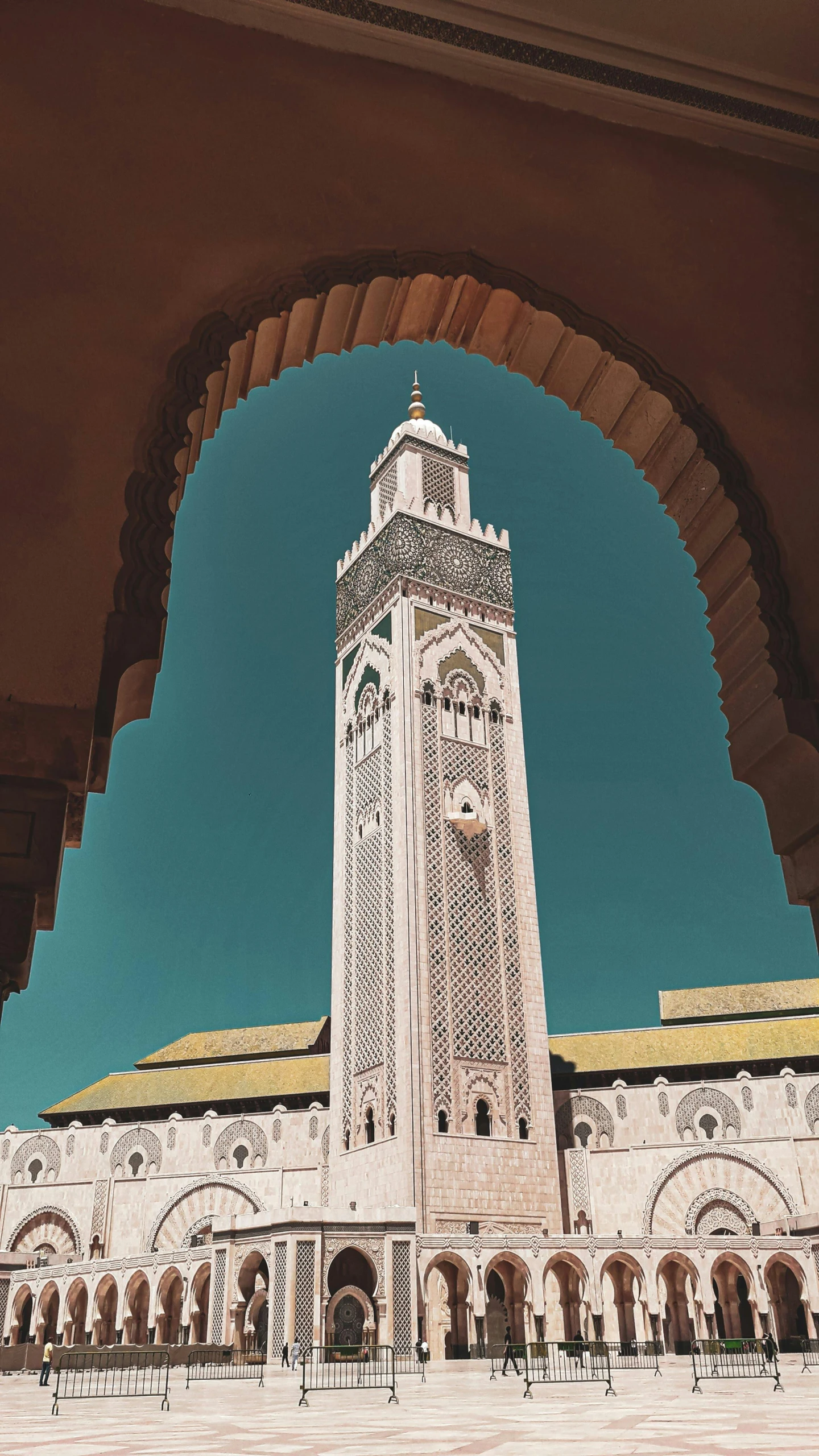 a large white building with a clock tower, inspired by Alberto Morrocco, unsplash contest winner, arabesque, archway, overview, muslim, university