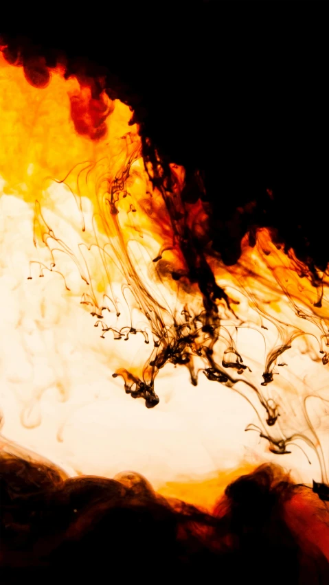 a close up of a fire with smoke coming out of it, an abstract drawing, pexels, abstract expressionism, liquid translucent amber, black, bird view, splashes