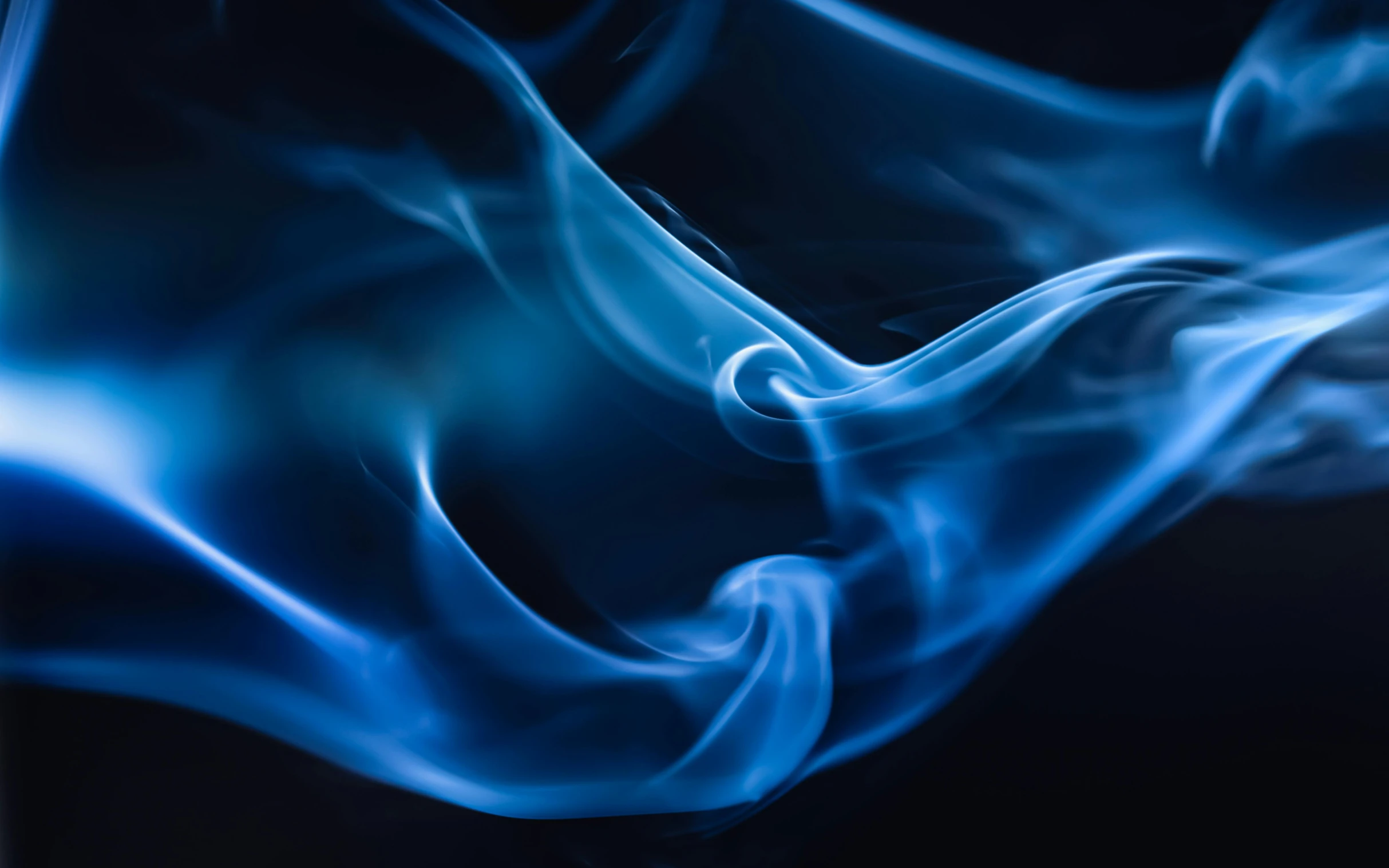 a close up of blue smoke on a black background, by Daniel Lieske, pexels contest winner, swirls of fire, swoosh, instagram post, light blues