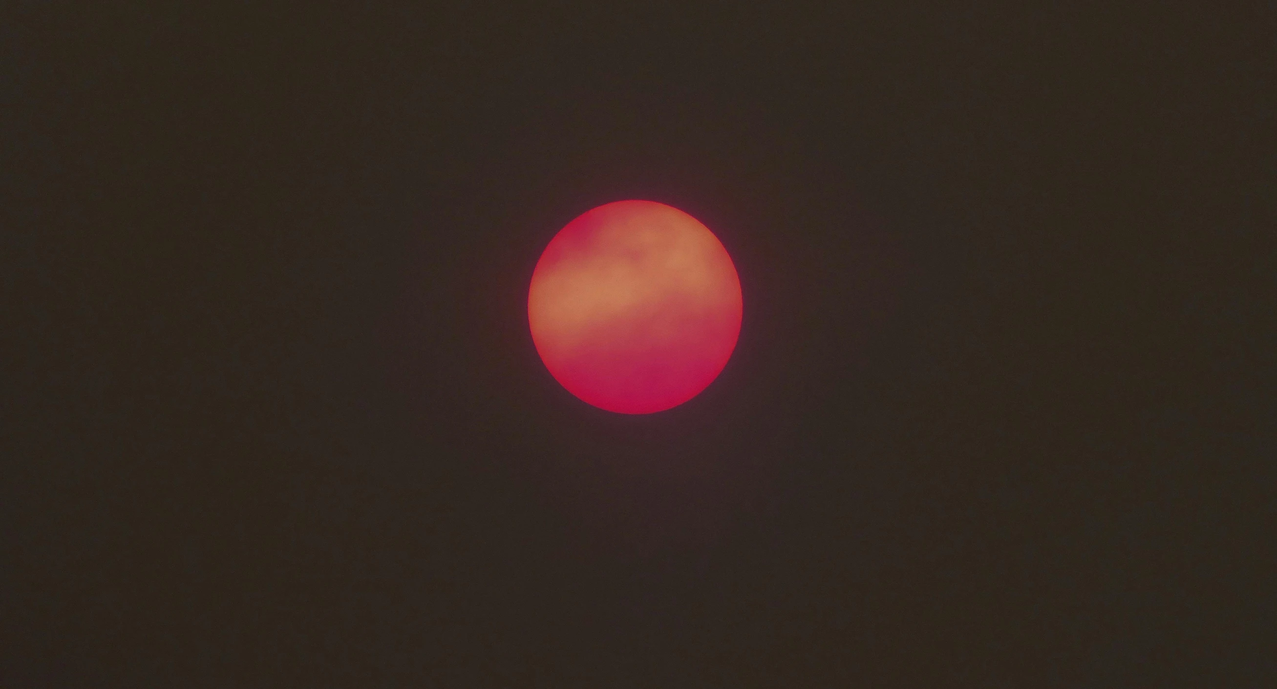 the sun is setting in the dark sky, an album cover, by Attila Meszlenyi, pexels contest winner, bauhaus, mangeta smoke red light, pink sun, photo 35mm, raspberry