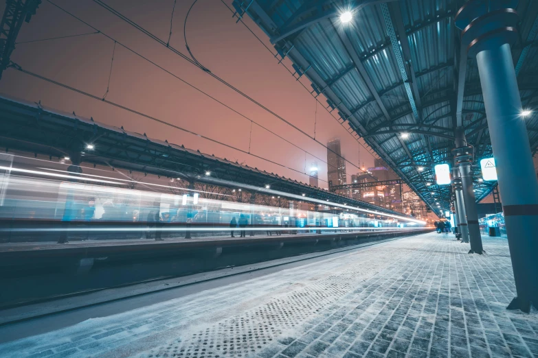 a train traveling past a train station at night, pexels contest winner, thumbnail, grey, hyperspeed, profile pic