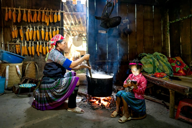 a woman and child cooking over an open fire, a portrait, pexels contest winner, in style of lam manh, avatar image, indoor scene, thumbnail