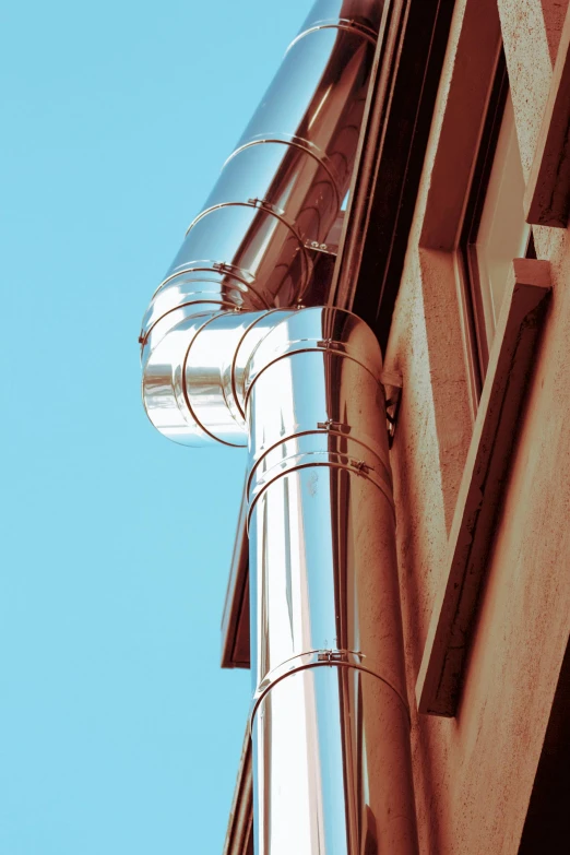 a metal pipe sticking out of the side of a building, quality draughtmanship, looking upwards, in the sun, profile image