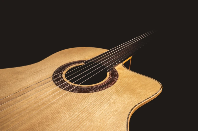 a close up of a guitar on a black background, an album cover, inspired by Carlos Enríquez Gómez, shutterstock, baroque, bass wood, detailed product image, angle view, curvature