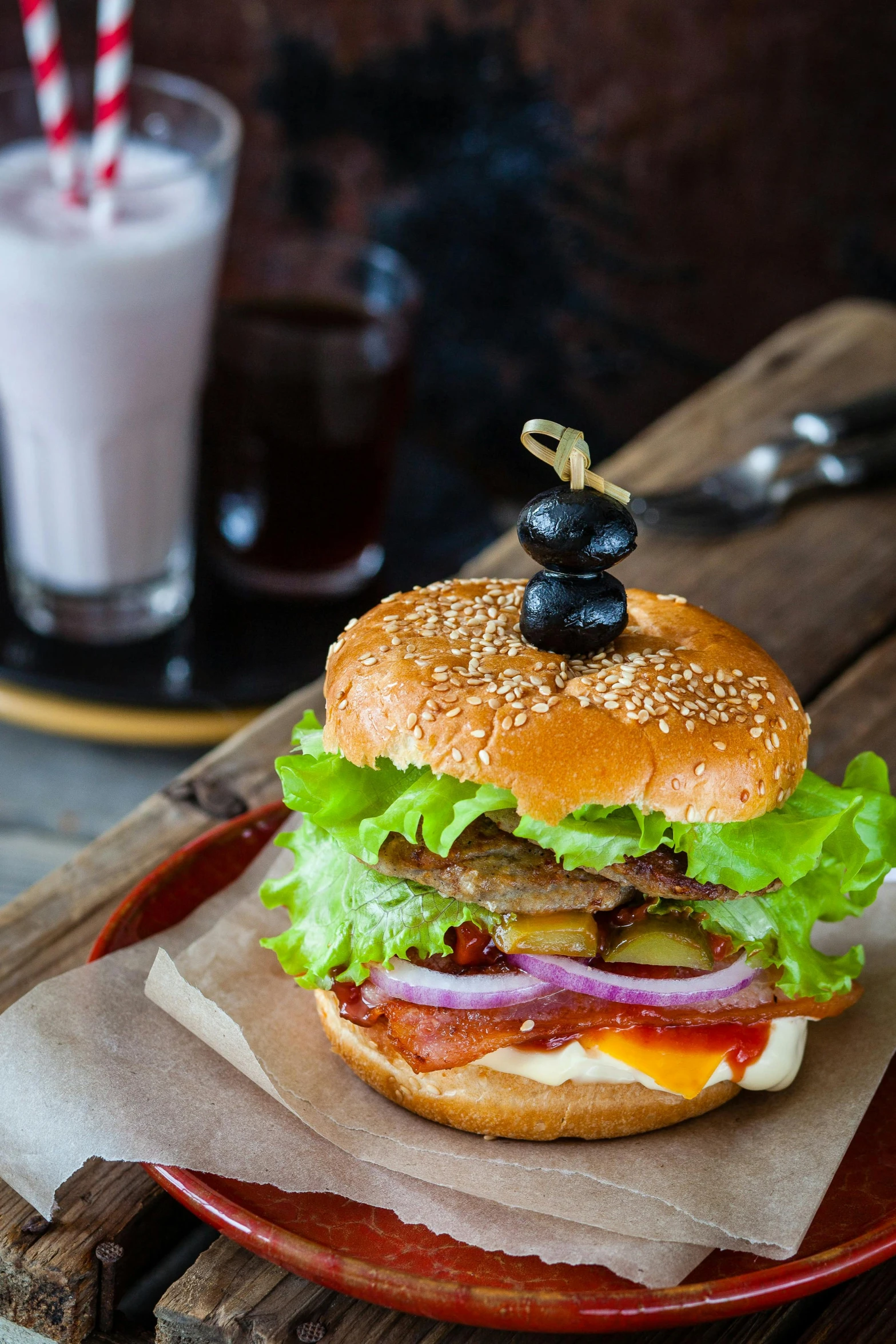 a hamburger sitting on top of a plate next to a glass of milk, a portrait, by Daniel Seghers, shutterstock, square, rustic, 15081959 21121991 01012000 4k, bao phan