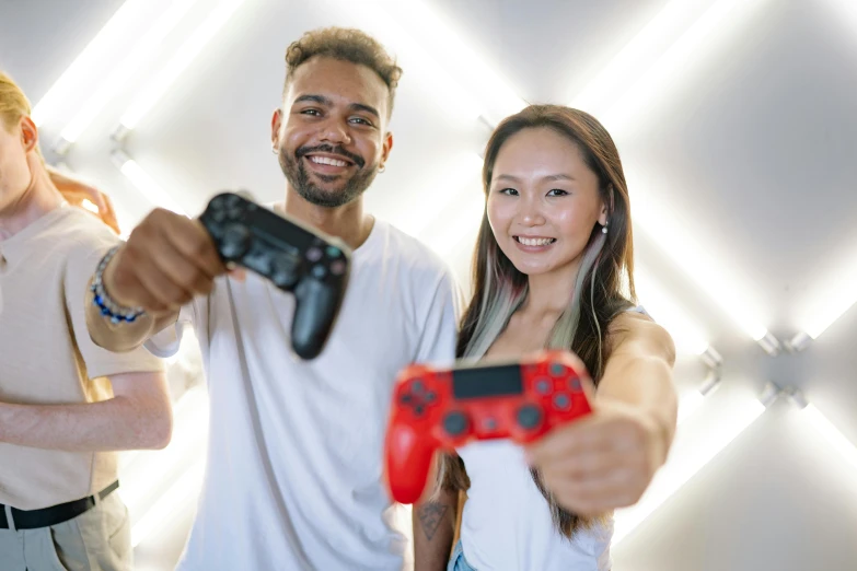 a man and a woman holding video game controllers, pexels contest winner, jordan grimmer and natasha tan, sport game, profile image, diverse