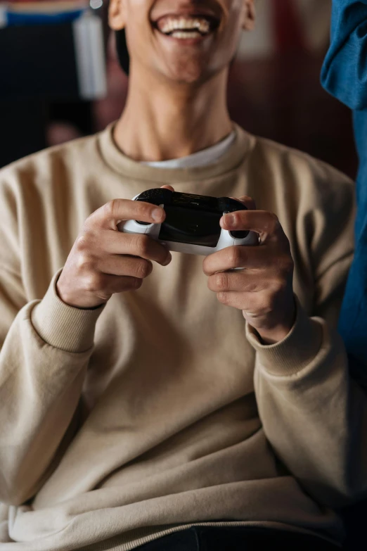 a man smiles as he plays a video game, unsplash, renaissance, instagram post, comforting, closeup photograph, ps 5