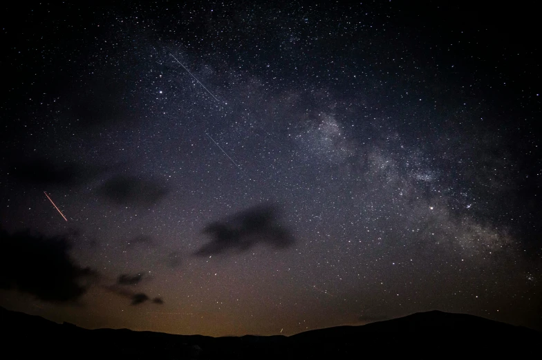 a night sky filled with lots of stars, by Niko Henrichon, pexels contest winner, meteorite, dark, milkyway light, instagram post