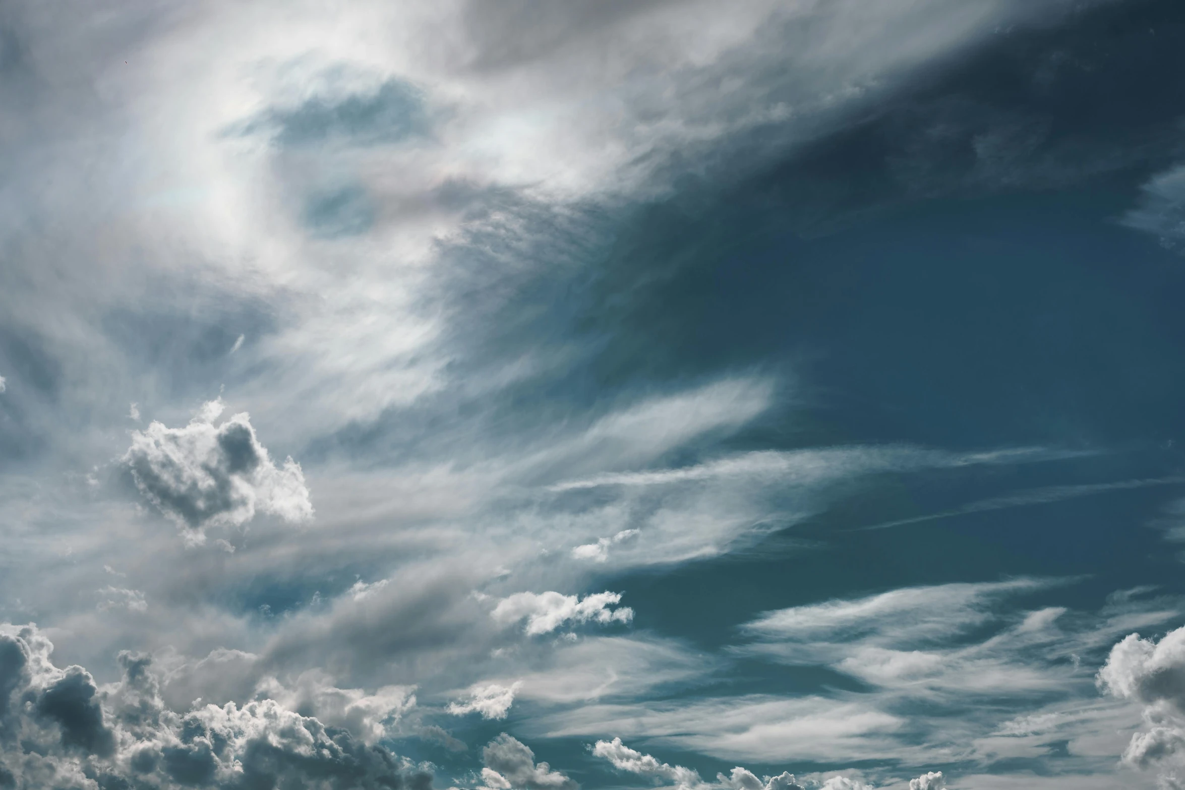 a man flying a kite on top of a lush green field, by Peter Churcher, pexels contest winner, romanticism, layered stratocumulus clouds, panorama view of the sky, grey, vertical wallpaper