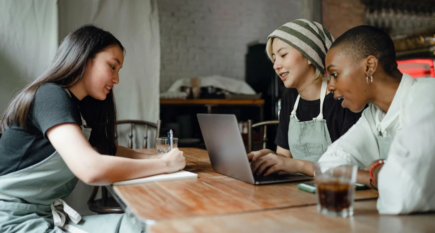 a group of women sitting at a table with a laptop, trending on pexels, avatar image, asian descent, high quality image, thumbnail