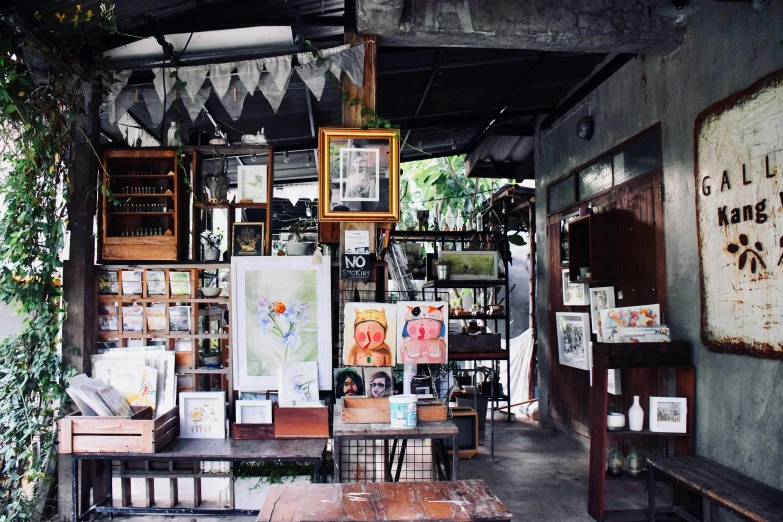 a store filled with lots of bottles of wine, a portrait, visual art, bangkuart, al fresco, picture frames, a wooden