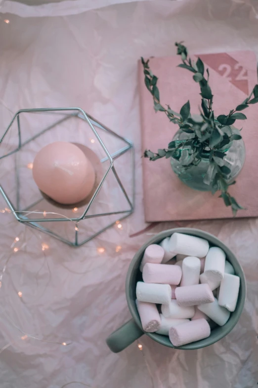 a bowl of marshmallows next to a cup of coffee, inspired by Elsa Bleda, pexels contest winner, aestheticism, diamond and rose quartz, an egg, decoration around the room, displayed on an altar