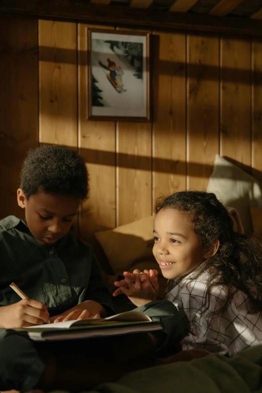 a couple of kids sitting on top of a bed, warmly lit posh study, letterboxing, in a cabin, ( ( theatrical ) )