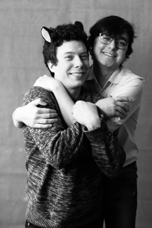 a black and white photo of two people hugging each other, portrait of jughead jones, ben folds portrait, 15081959 21121991 01012000 4k, with bunny ears