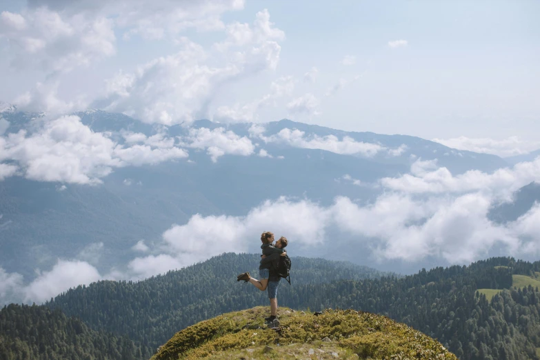 a person standing on top of a mountain with a backpack, by Emma Andijewska, pexels contest winner, floating in the air, cottagecore hippie, 4k post, view(full body + zoomed out)