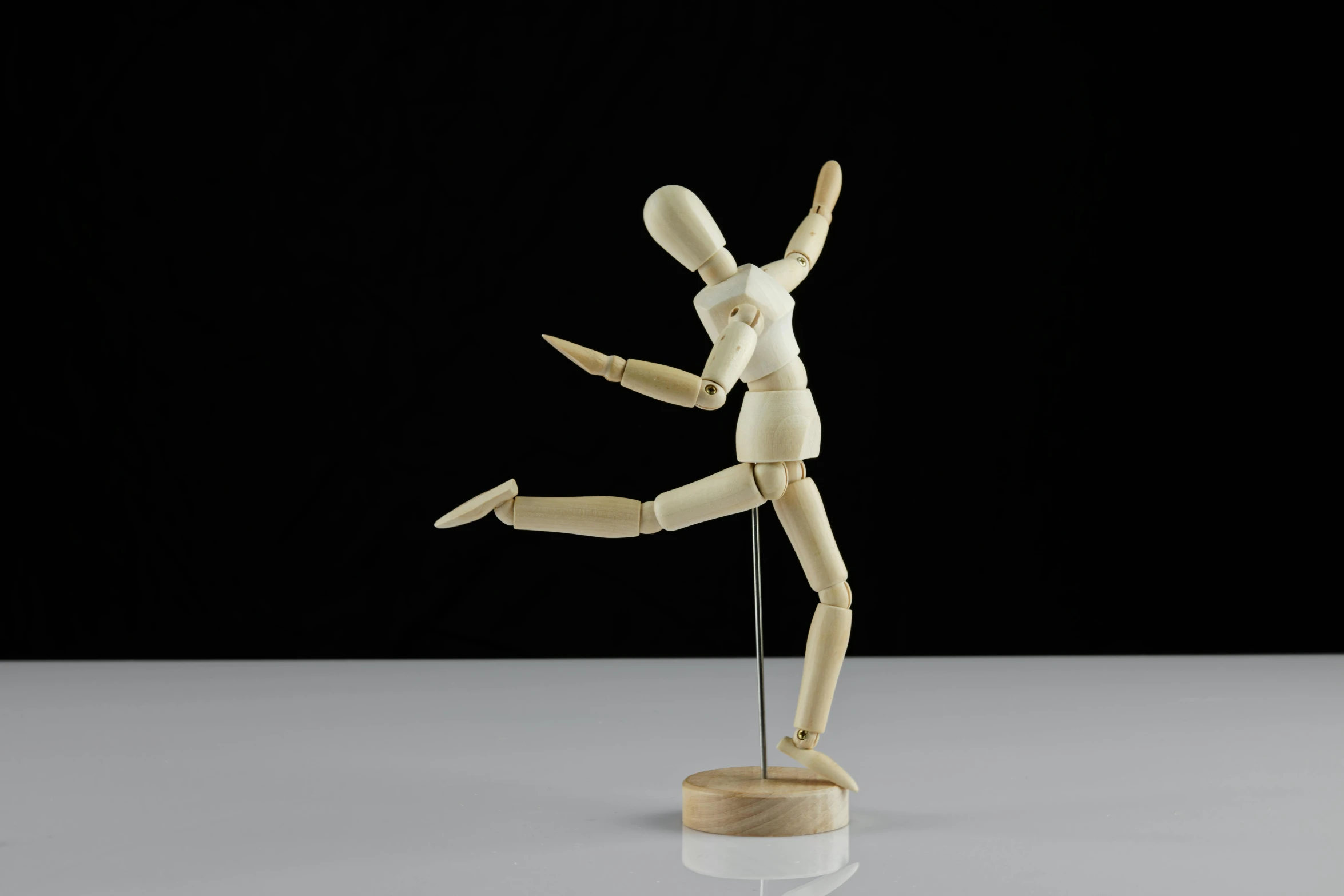 a wooden mannequin standing on a stand, inspired by James Wood, dynamic dancing pose, 1 figure only, fully posable, with a wooden stuff