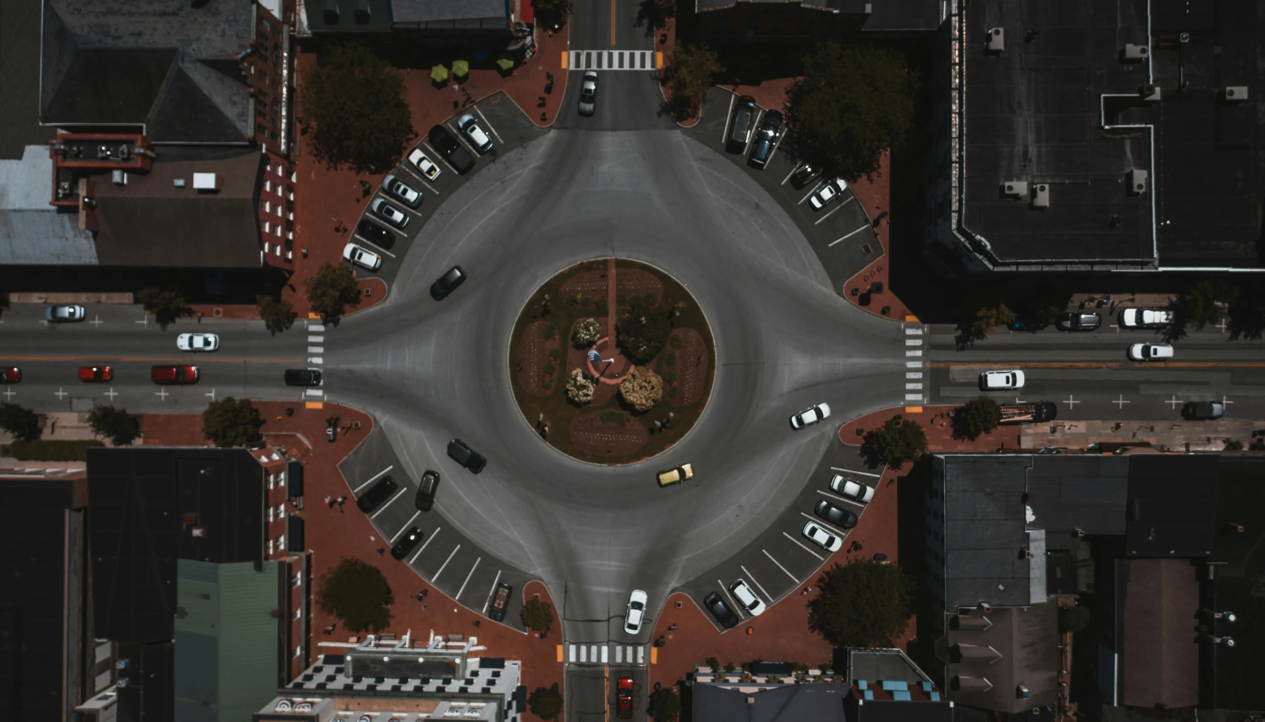 a bird's eye view of a city intersection, by Carey Morris, unsplash contest winner, photorealism, ornamental halo, round format, square, vehicle