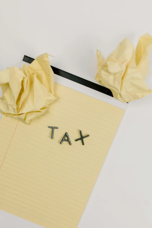 a piece of paper with the word tax written on it, a cartoon, by Adam Rex, pexels, conceptual art, on a yellow canva, minna sundberg, thumbnail, 2000s photo