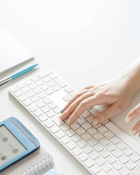 a close up of a person typing on a keyboard, a computer rendering, trending on pexels, queer woman, white space in middle, a high angle shot, wikihow