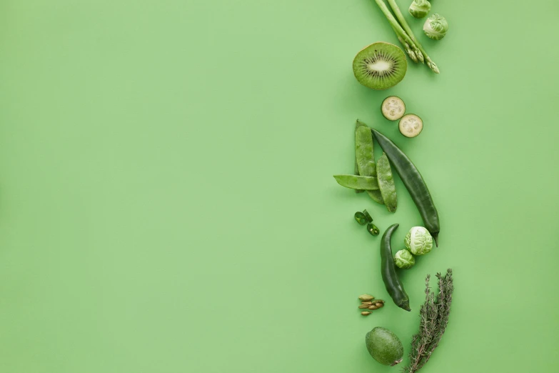 various fruits and vegetables laid out on a green surface, inspired by Art Green, trending on pexels, monochromatic green, background image, blender, soup