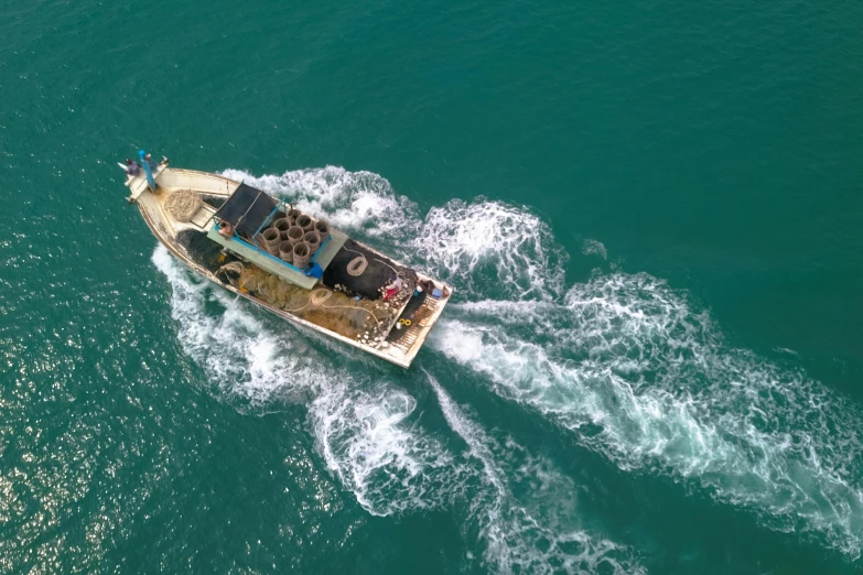 a small boat in the middle of the ocean, a digital rendering, pexels contest winner, hurufiyya, paua shell, farming, operation, photo from above