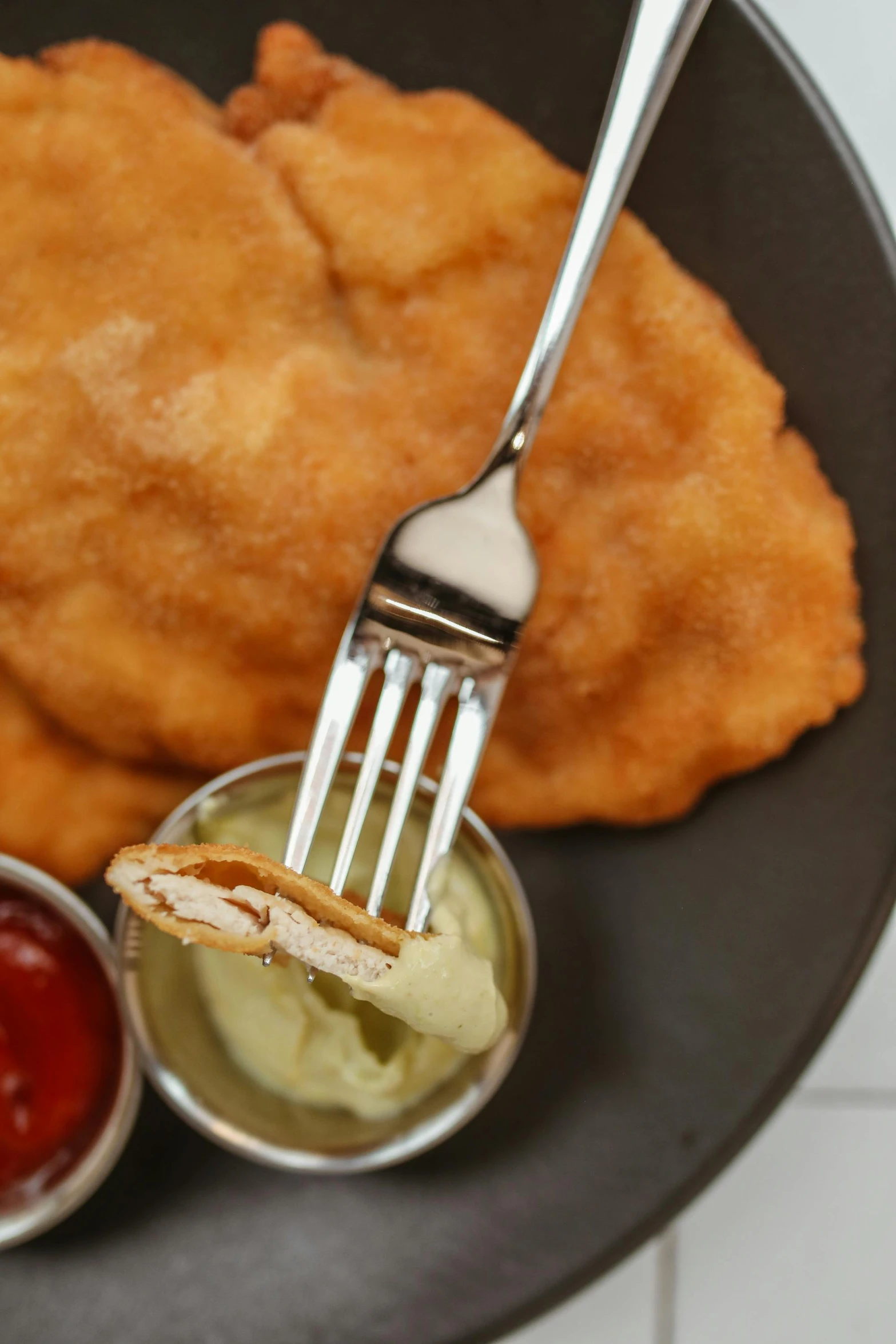 a close up of a plate of food with a fork, inspired by Károly Patkó, battered, spatula, yan gisuka, square