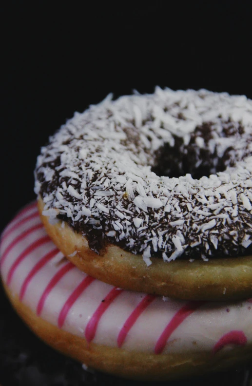 a couple of donuts sitting on top of each other, b - roll, coconuts, black forest, sydney hanson