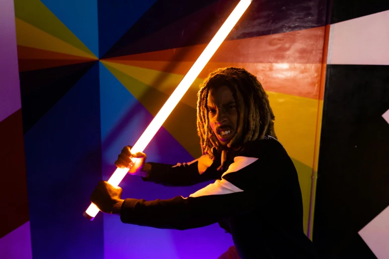 a man with dreadlocks holding a light saber, pexels contest winner, colorful lighting, in intergalactic hq, rectangle, holding two swords