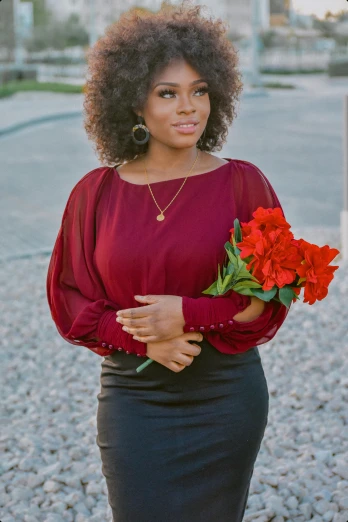 a woman in a red top and black skirt holding flowers, instagram, orisha, promo image, dolman, formal wear