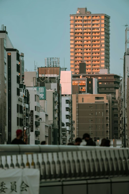 a group of people walking across a bridge next to tall buildings, trending on unsplash, ukiyo-e, view from the distance, late afternoon lighting, residential area, けもの