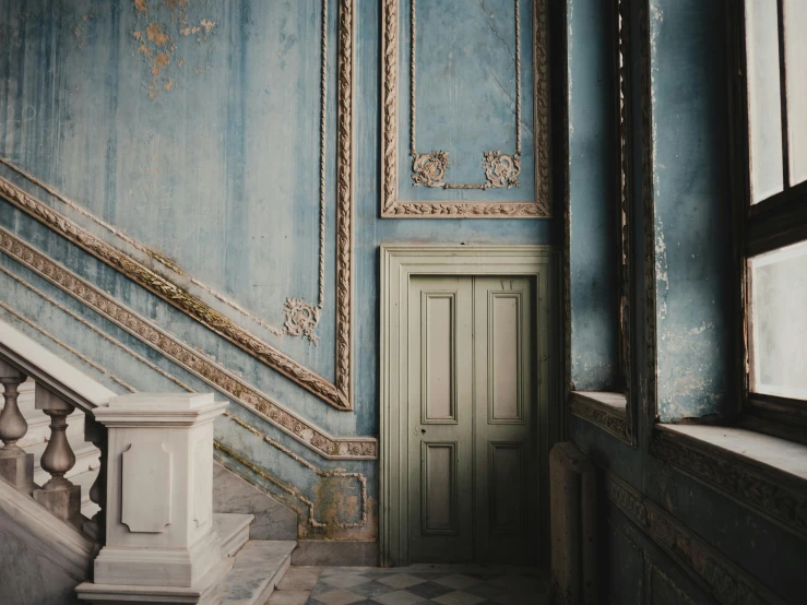 a door and some stairs in a room, an album cover, pexels contest winner, neoclassicism, blue, patina, royal interior, muted palette