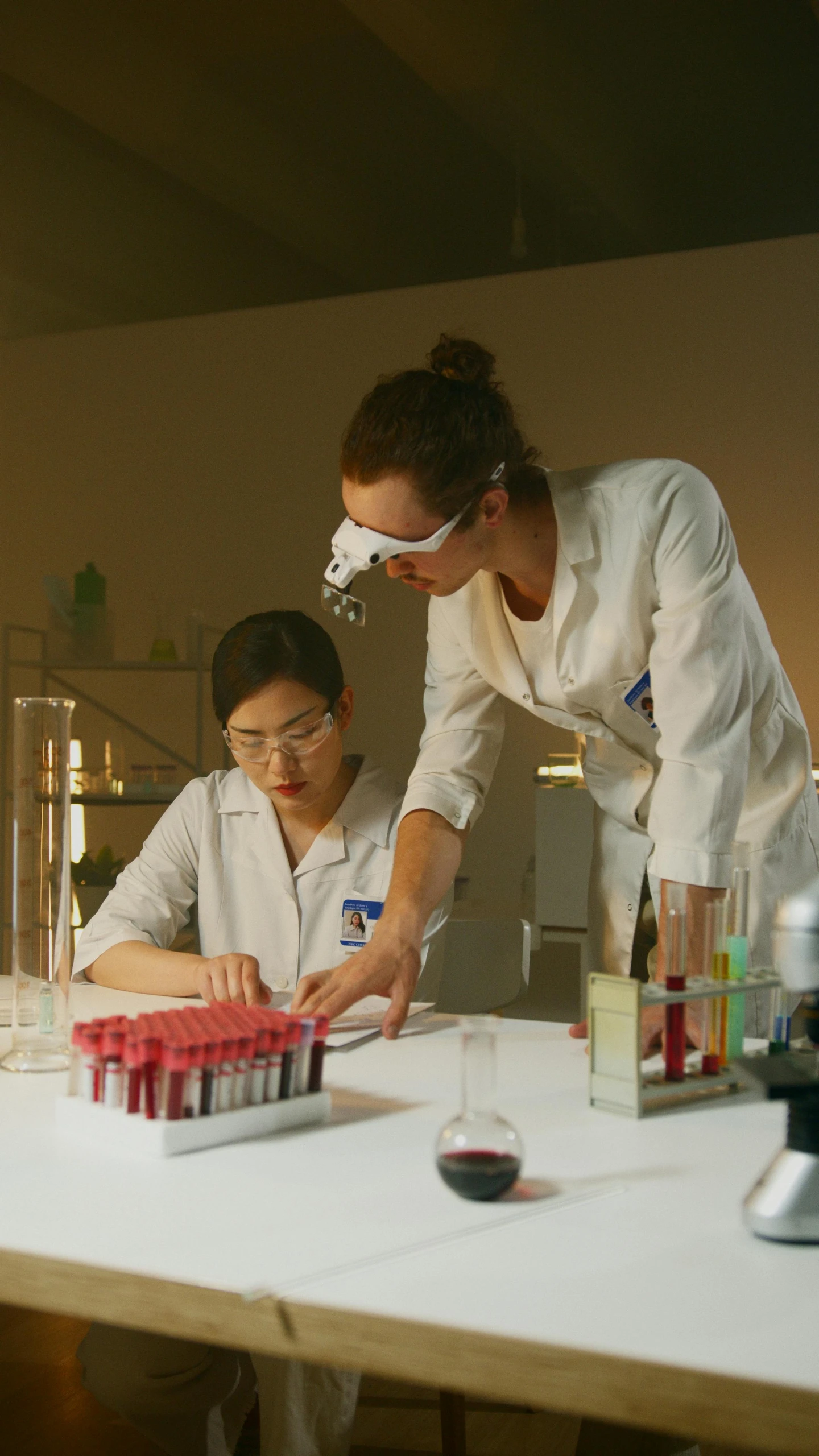 a couple of people that are in a lab, fujicolor sample, high-quality photo, complete scene, plating