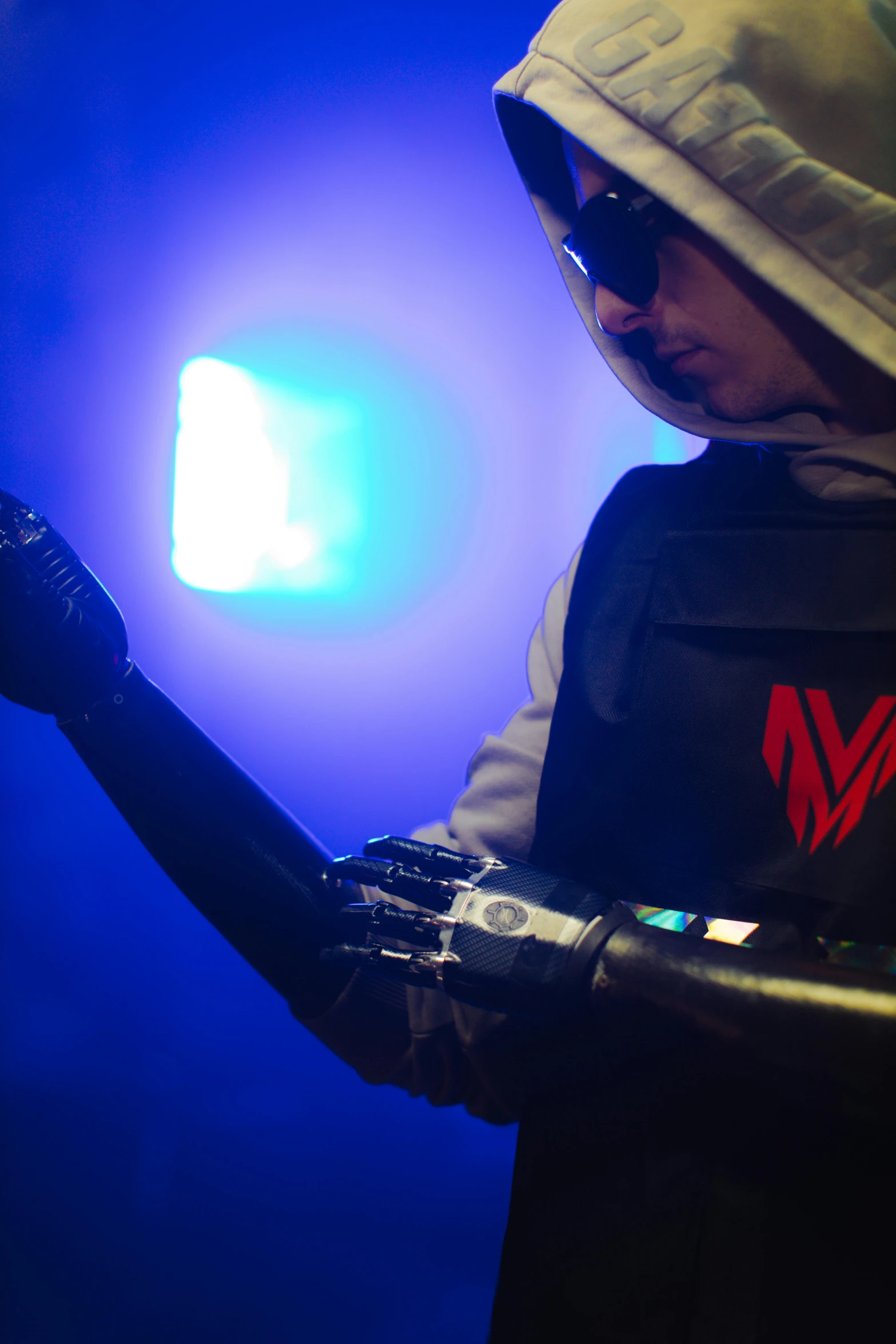 a close up of a person in a costume, altermodern, prosthetic arm, mk ninja, hacking into the mainframe, r / vexilology