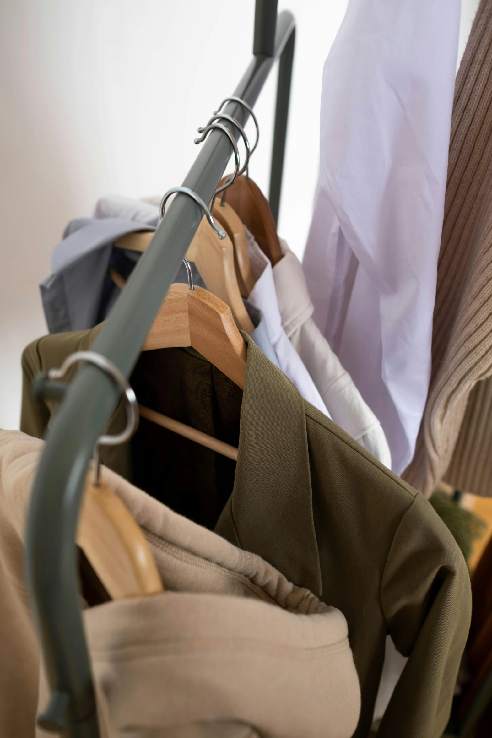 a bunch of clothes hanging on a clothes rack, by Konrad Witz, khakis, upclose, collection product, 8l