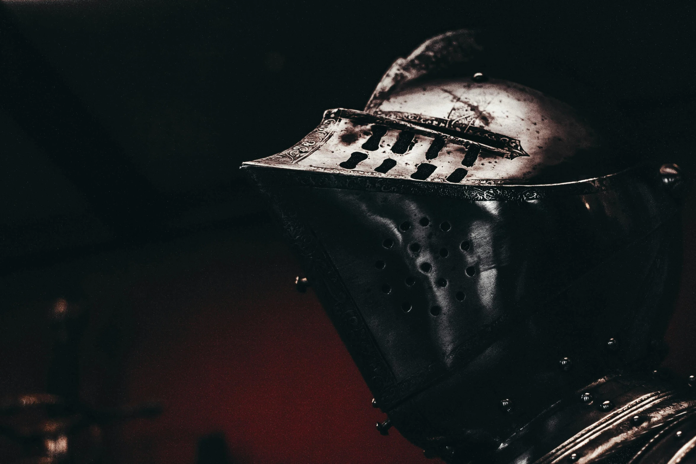 a close up of a helmet on a person, pexels contest winner, renaissance, dark armor, instagram post, ned kelly, silver armor and red clothing