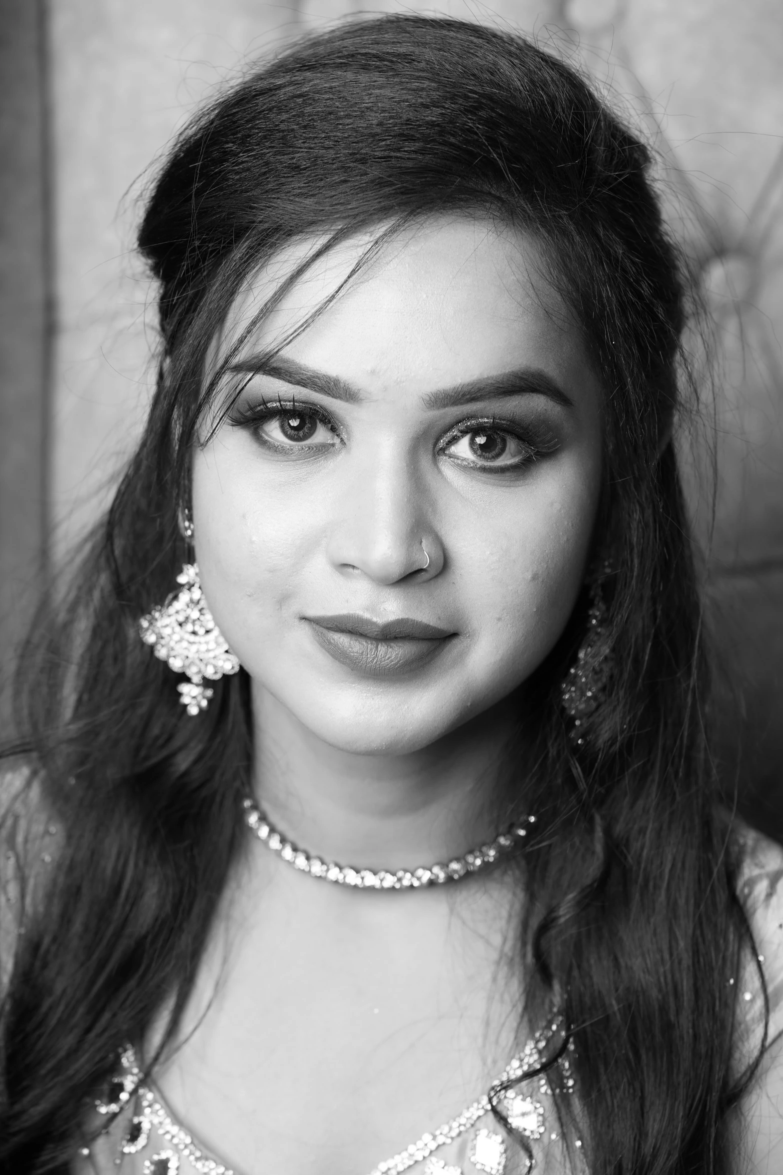 a black and white photo of a woman, inspired by Saurabh Jethani, reddit, hurufiyya, looking cute, square, satin, young female