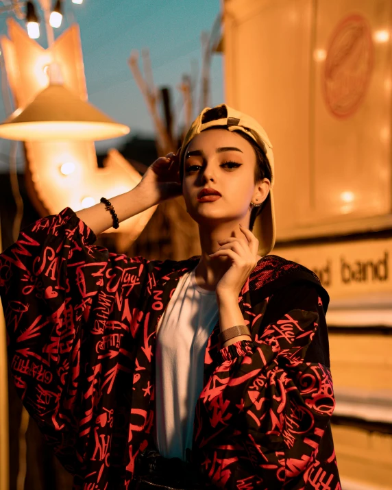 a woman standing in front of a food truck, an album cover, by Julia Pishtar, trending on pexels, graffiti, wearing dark silk robe, red lighting, beautiful androgynous girl, ((sunset))