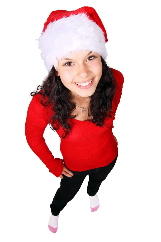 a woman in a santa hat poses for a picture, a cartoon, pexels, wearing casual clothing, smiling down from above, taken in the late 2010s, profile image