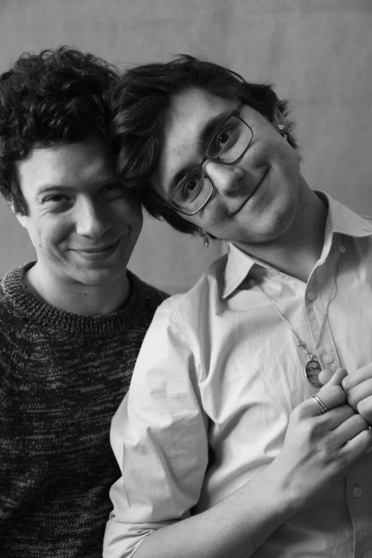 a couple of men standing next to each other, an album cover, by Felix-Kelly, harry potter!!, tri - x, joe keery, john egbert