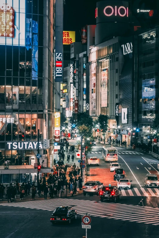 a busy city street filled with lots of traffic, inspired by Sōtarō Yasui, pexels contest winner, square, ethnicity : japanese, ad image, nightlife