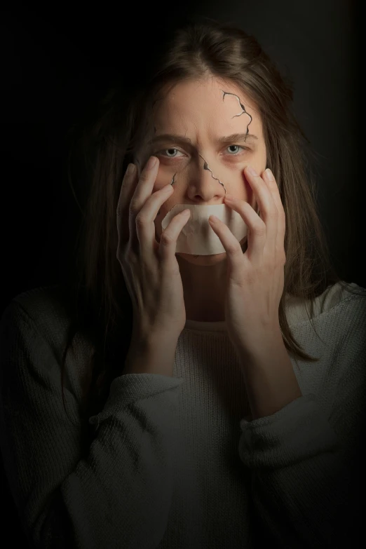 a woman holding a cup of coffee in front of her face, inspired by Gottfried Helnwein, renaissance, movie still of a snarling, covered in bandages, hair over face, promo photo