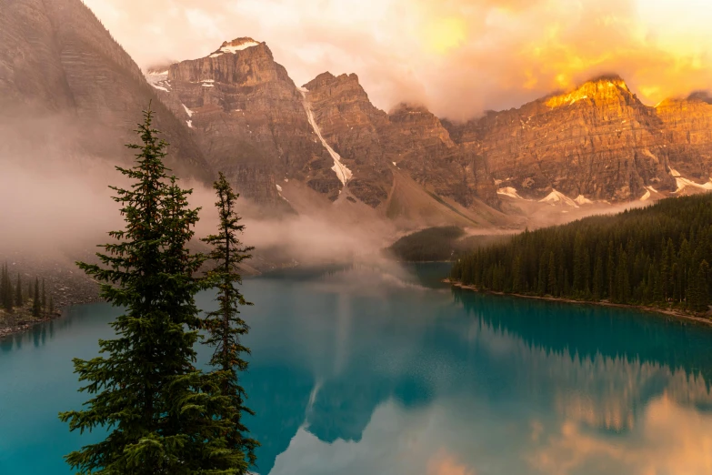 a large body of water surrounded by mountains, a photo, inspired by James Pittendrigh MacGillivray, pexels contest winner, avatar image, fan favorite, canada, soft glow