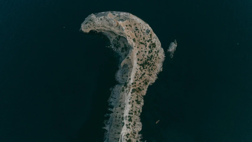 an aerial view of a body of water, by Adam Marczyński, unsplash contest winner, surrealism, croatian coastline, tyre mark, flying rocky island, thumbnail